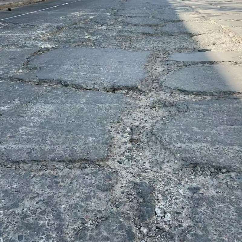 东兴路面起砂露石子修补料